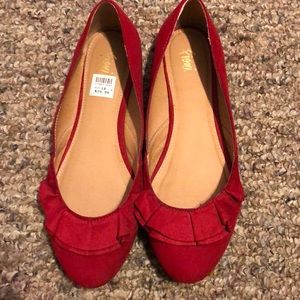 Red ballerina flats
